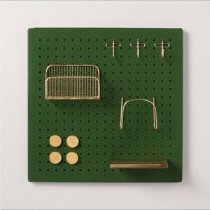 Green Pegboard with Gold Accessories